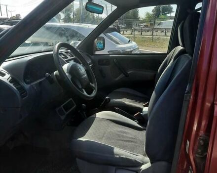 Червоний Ніссан Terrano II, об'ємом двигуна 2.4 л та пробігом 278 тис. км за 7800 $, фото 4 на Automoto.ua