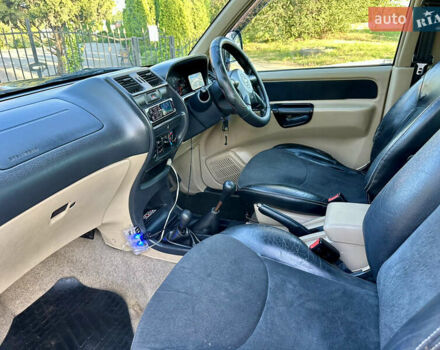 Синій Ніссан Terrano II, об'ємом двигуна 3 л та пробігом 168 тис. км за 4500 $, фото 11 на Automoto.ua