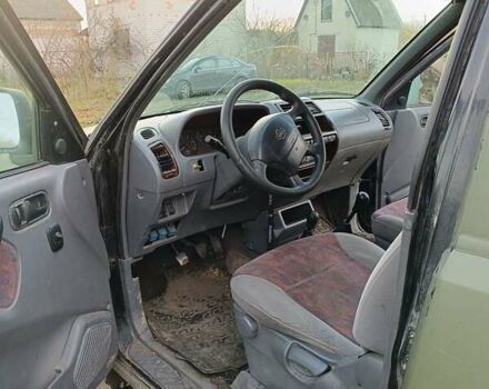 Зеленый Ниссан Terrano II, объемом двигателя 2.7 л и пробегом 327 тыс. км за 2400 $, фото 12 на Automoto.ua