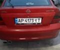 Красный Опель 1.8 Liter, объемом двигателя 1.8 л и пробегом 300 тыс. км за 2400 $, фото 12 на Automoto.ua