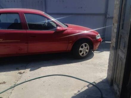 Опель 1.8 Liter 2001 в Запорожье на Automoto.ua Красный Опель 1.8 Liter, объемом двигателя 1.8 л и пробегом 300 тыс. км за 2400 $, фото 1 на Automoto.ua
