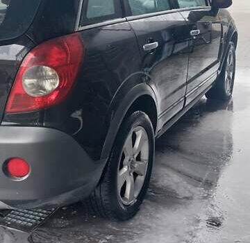 Черный Опель Антара, объемом двигателя 2 л и пробегом 270 тыс. км за 8650 $, фото 8 на Automoto.ua