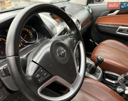Чорний Опель Антара, об'ємом двигуна 2 л та пробігом 250 тис. км за 8950 $, фото 31 на Automoto.ua