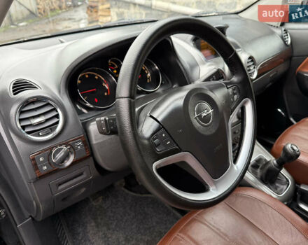 Чорний Опель Антара, об'ємом двигуна 2 л та пробігом 250 тис. км за 8950 $, фото 29 на Automoto.ua