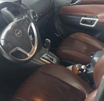 Черный Опель Антара, объемом двигателя 2 л и пробегом 270 тыс. км за 8650 $, фото 3 на Automoto.ua