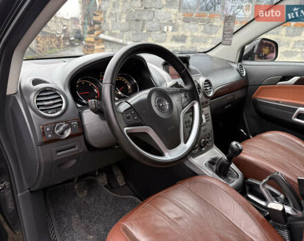 Чорний Опель Антара, об'ємом двигуна 2 л та пробігом 250 тис. км за 8950 $, фото 28 на Automoto.ua