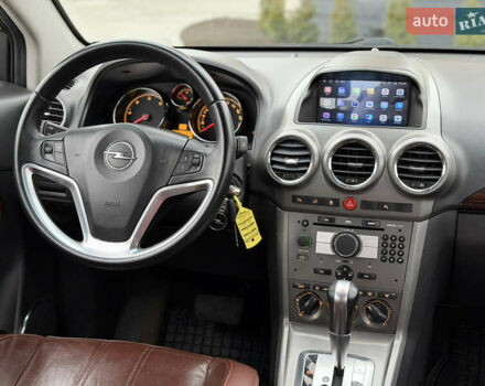 Черный Опель Антара, объемом двигателя 1.99 л и пробегом 226 тыс. км за 8500 $, фото 48 на Automoto.ua