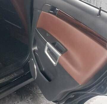 Черный Опель Антара, объемом двигателя 2 л и пробегом 270 тыс. км за 8650 $, фото 2 на Automoto.ua