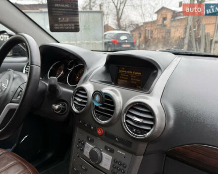 Чорний Опель Антара, об'ємом двигуна 2 л та пробігом 250 тис. км за 8950 $, фото 61 на Automoto.ua