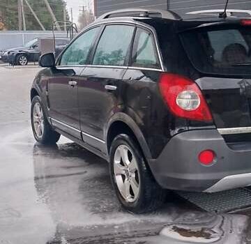 Черный Опель Антара, объемом двигателя 2 л и пробегом 270 тыс. км за 8650 $, фото 1 на Automoto.ua