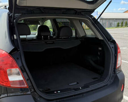 Черный Опель Антара, объемом двигателя 2.23 л и пробегом 178 тыс. км за 11200 $, фото 4 на Automoto.ua