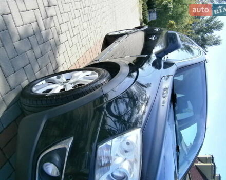 Чорний Опель Антара, об'ємом двигуна 2.23 л та пробігом 211 тис. км за 11200 $, фото 2 на Automoto.ua