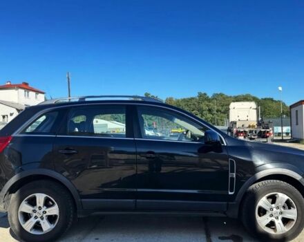 Черный Опель Антара, объемом двигателя 2.2 л и пробегом 155 тыс. км за 7800 $, фото 4 на Automoto.ua