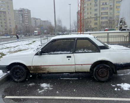 Белый Опель Аскона, объемом двигателя 1.6 л и пробегом 200 тыс. км за 299 $, фото 3 на Automoto.ua