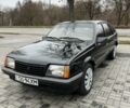 Черный Опель Аскона, объемом двигателя 1.6 л и пробегом 1000 тыс. км за 900 $, фото 1 на Automoto.ua