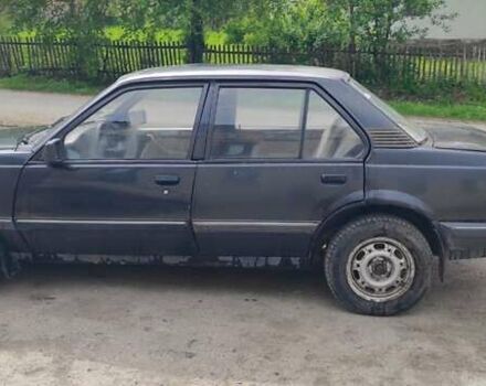 Черный Опель Аскона, объемом двигателя 1.6 л и пробегом 200 тыс. км за 500 $, фото 2 на Automoto.ua