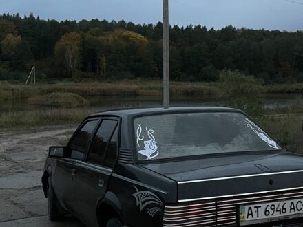 Черный Опель Аскона, объемом двигателя 1.6 л и пробегом 176 тыс. км за 450 $, фото 1 на Automoto.ua