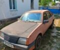 Красный Опель Аскона, объемом двигателя 1.6 л и пробегом 333 тыс. км за 601 $, фото 1 на Automoto.ua