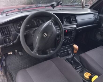 Красный Опель Аскона, объемом двигателя 1.6 л и пробегом 300 тыс. км за 1000 $, фото 2 на Automoto.ua