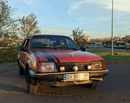 Красный Опель Аскона, объемом двигателя 1.6 л и пробегом 392 тыс. км за 100 $, фото 1 на Automoto.ua