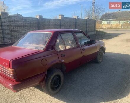 Красный Опель Аскона, объемом двигателя 1.8 л и пробегом 300 тыс. км за 307 $, фото 2 на Automoto.ua