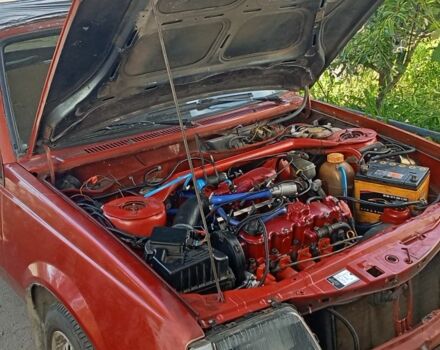 Красный Опель Аскона, объемом двигателя 2 л и пробегом 400 тыс. км за 1122 $, фото 1 на Automoto.ua
