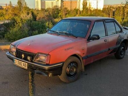 Красный Опель Аскона, объемом двигателя 1.6 л и пробегом 392 тыс. км за 100 $, фото 1 на Automoto.ua