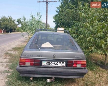 Серый Опель Аскона, объемом двигателя 1.6 л и пробегом 300 тыс. км за 450 $, фото 1 на Automoto.ua