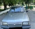 Серый Опель Аскона, объемом двигателя 1.6 л и пробегом 300 тыс. км за 650 $, фото 1 на Automoto.ua