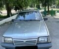 Серый Опель Аскона, объемом двигателя 1.6 л и пробегом 300 тыс. км за 650 $, фото 1 на Automoto.ua