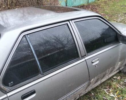 Серый Опель Аскона, объемом двигателя 2 л и пробегом 215 тыс. км за 350 $, фото 1 на Automoto.ua