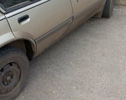 Серый Опель Аскона, объемом двигателя 1.8 л и пробегом 93 тыс. км за 833 $, фото 1 на Automoto.ua