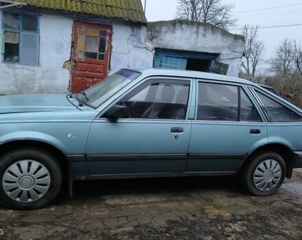Синий Опель Аскона, объемом двигателя 1.6 л и пробегом 90 тыс. км за 750 $, фото 1 на Automoto.ua