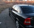 Черный Опель Астра Г, объемом двигателя 1.6 л и пробегом 180 тыс. км за 2600 $, фото 1 на Automoto.ua