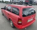 Червоний Опель Астра Г, об'ємом двигуна 14.86 л та пробігом 311 тис. км за 2450 $, фото 2 на Automoto.ua