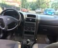 Червоний Опель Астра Г, об'ємом двигуна 1.4 л та пробігом 173 тис. км за 1300 $, фото 1 на Automoto.ua