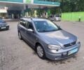 Серый Опель Астра Г, объемом двигателя 2 л и пробегом 210 тыс. км за 4800 $, фото 1 на Automoto.ua