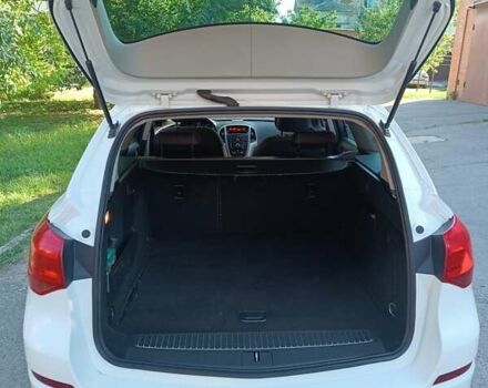 Білий Опель Астра ГТЦ, об'ємом двигуна 1.3 л та пробігом 320 тис. км за 6000 $, фото 5 на Automoto.ua