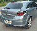 Серый Опель Астра ГТЦ, объемом двигателя 1.25 л и пробегом 300 тыс. км за 4299 $, фото 2 на Automoto.ua