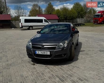 Серый Опель Астра ГТЦ, объемом двигателя 1.7 л и пробегом 308 тыс. км за 6028 $, фото 1 на Automoto.ua
