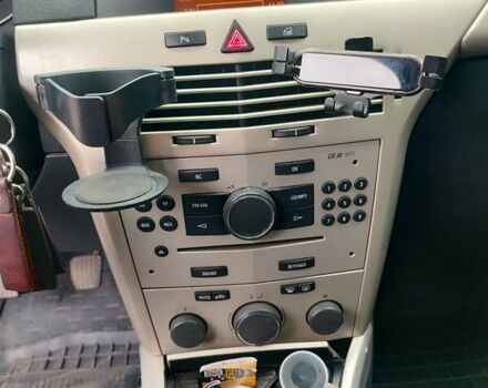 Синий Опель Астра ГТЦ, объемом двигателя 1.6 л и пробегом 233 тыс. км за 6000 $, фото 12 на Automoto.ua