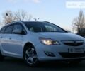 Білий Опель Астра Н, об'ємом двигуна 1.3 л та пробігом 170 тис. км за 7500 $, фото 1 на Automoto.ua