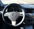 Черный Опель Астра Н, объемом двигателя 1.6 л и пробегом 177 тыс. км за 6000 $, фото 3 на Automoto.ua
