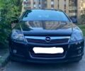 Черный Опель Астра Н, объемом двигателя 1.6 л и пробегом 75 тыс. км за 7100 $, фото 1 на Automoto.ua