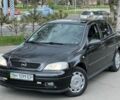 Черный Опель Астра Н, объемом двигателя 1.6 л и пробегом 130 тыс. км за 5199 $, фото 1 на Automoto.ua