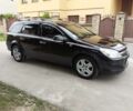 Черный Опель Астра Н, объемом двигателя 1.3 л и пробегом 200 тыс. км за 5700 $, фото 1 на Automoto.ua