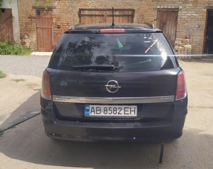 Черный Опель Астра Н, объемом двигателя 1.9 л и пробегом 226 тыс. км за 6500 $, фото 1 на Automoto.ua