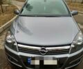 Серый Опель Астра Н, объемом двигателя 1.6 л и пробегом 151 тыс. км за 6000 $, фото 1 на Automoto.ua