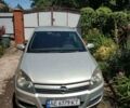Серый Опель Астра Н, объемом двигателя 1.6 л и пробегом 210 тыс. км за 5500 $, фото 1 на Automoto.ua