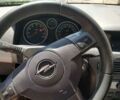 Серый Опель Астра Н, объемом двигателя 1.6 л и пробегом 210 тыс. км за 5500 $, фото 11 на Automoto.ua